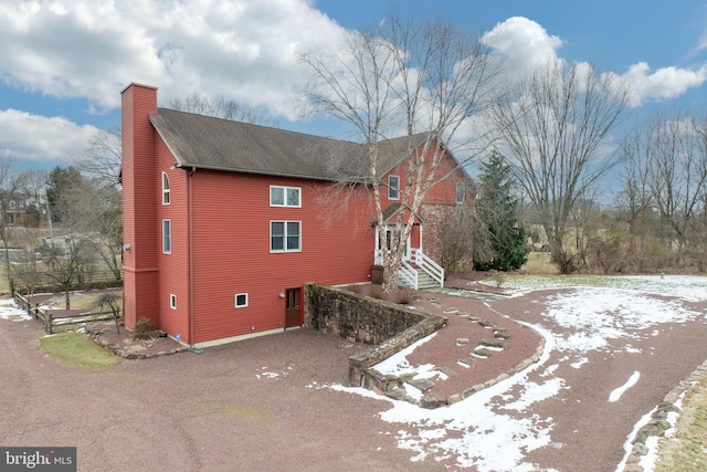 view of snow covered property