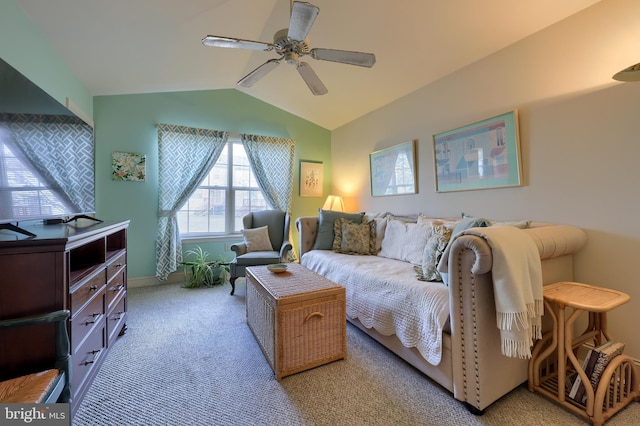 carpeted living area featuring lofted ceiling and ceiling fan