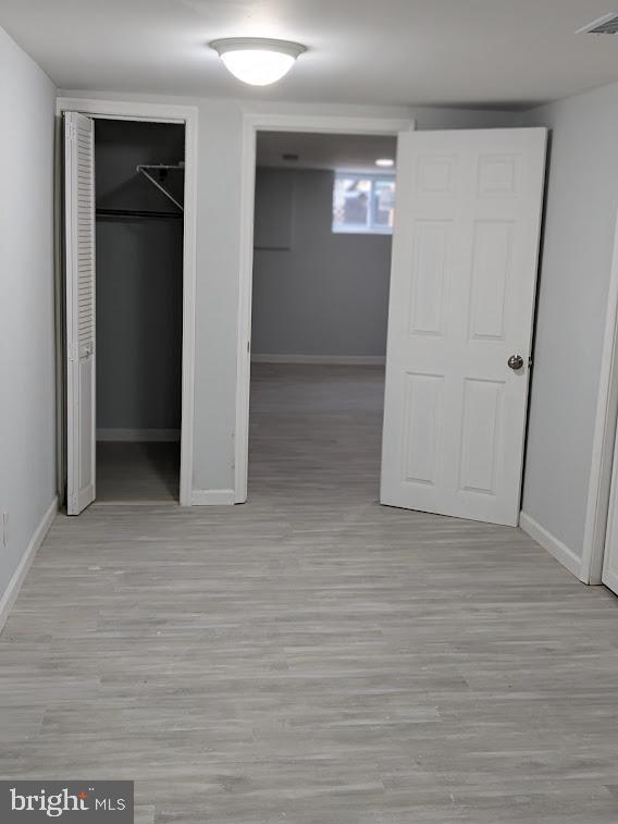 unfurnished bedroom featuring light hardwood / wood-style flooring