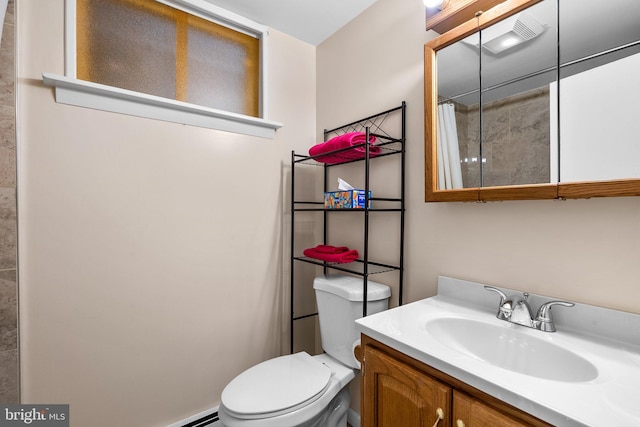 bathroom with walk in shower, vanity, and toilet