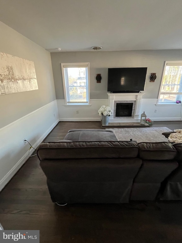 living room with dark wood-type flooring