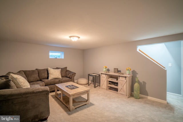 living room featuring light carpet