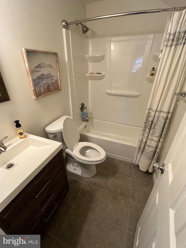 full bathroom with shower / tub combo with curtain, vanity, toilet, and tile patterned flooring