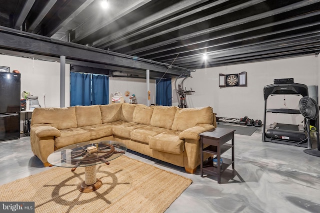 living room featuring concrete floors