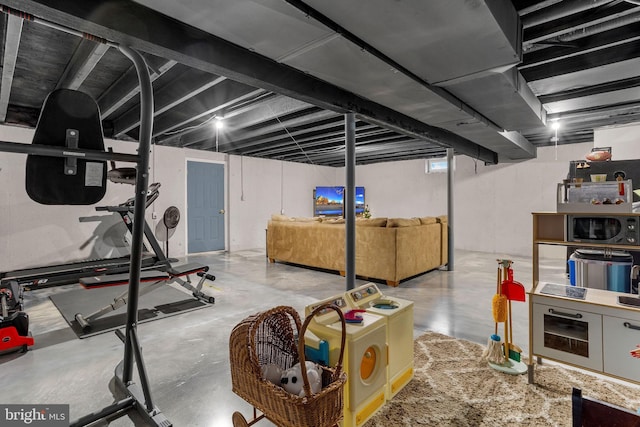 interior space with washer and clothes dryer