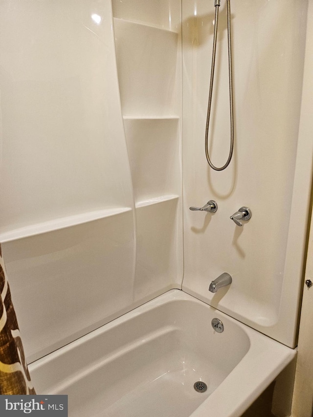 bathroom featuring shower / washtub combination