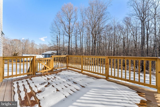 view of snow covered deck