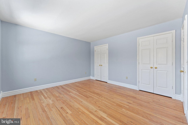 unfurnished bedroom featuring light hardwood / wood-style flooring