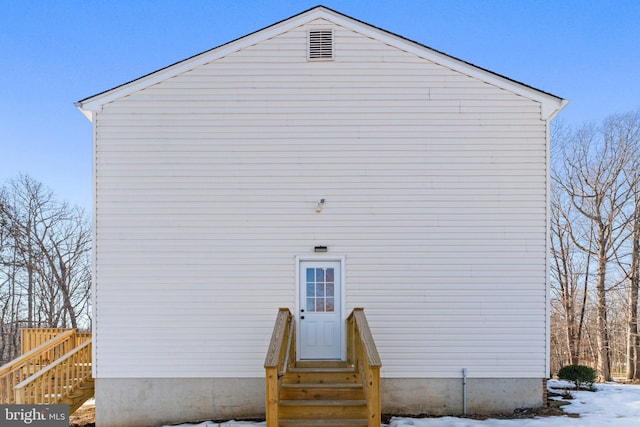 view of snow covered house