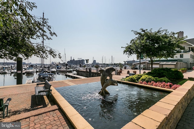 view of dock with a water view