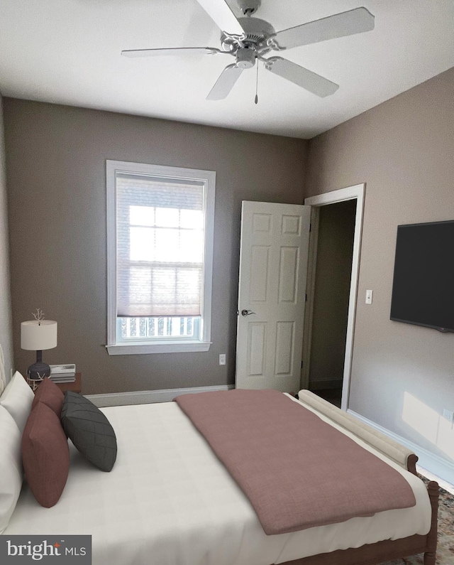 bedroom featuring ceiling fan