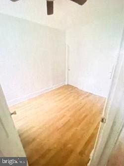 empty room featuring hardwood / wood-style flooring