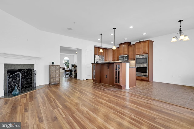 unfurnished living room featuring light wood-type flooring