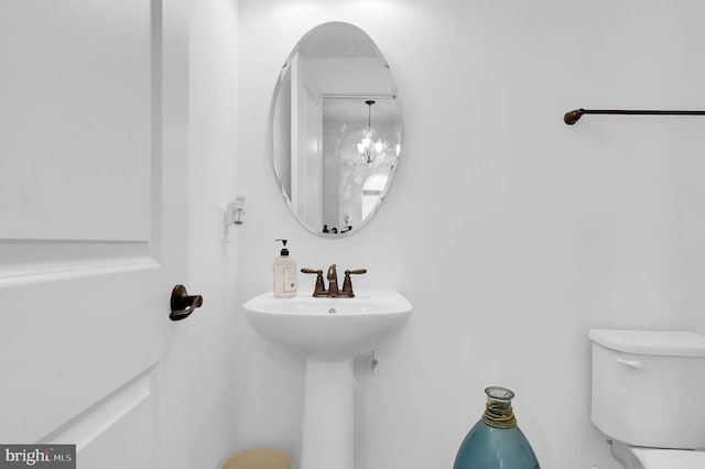 bathroom with sink and toilet