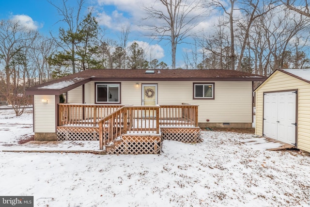 view of front of home featuring a shed and a wooden deck