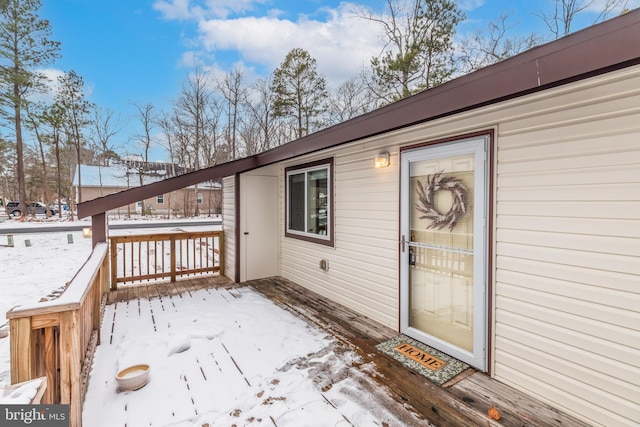 view of snow covered deck