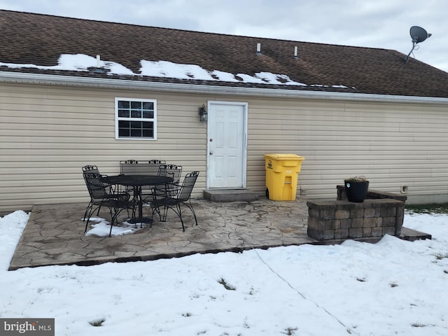 view of snow covered patio