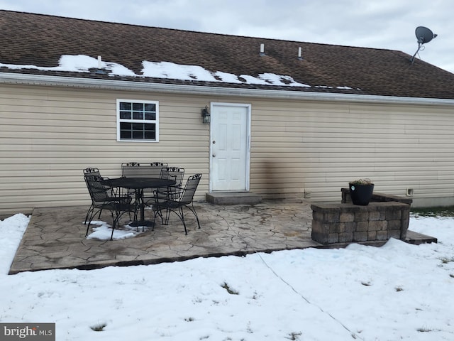 view of snow covered house