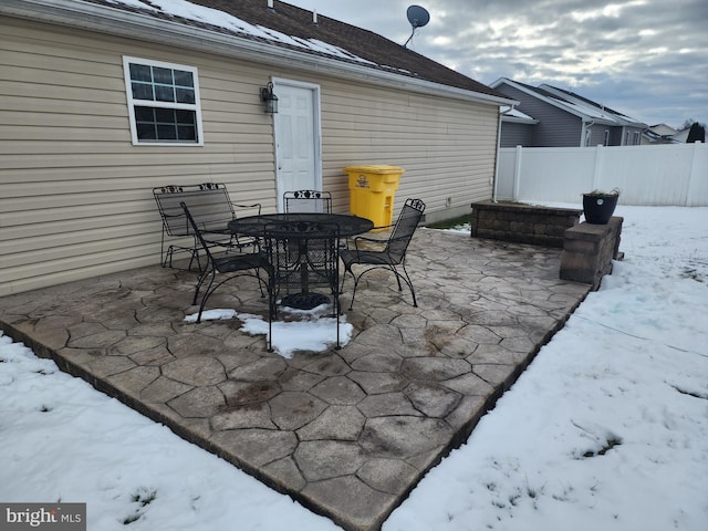 view of snow covered patio