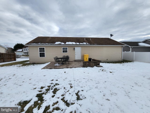 view of snow covered house