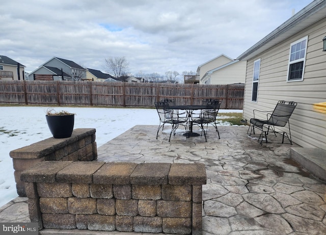 view of snow covered patio