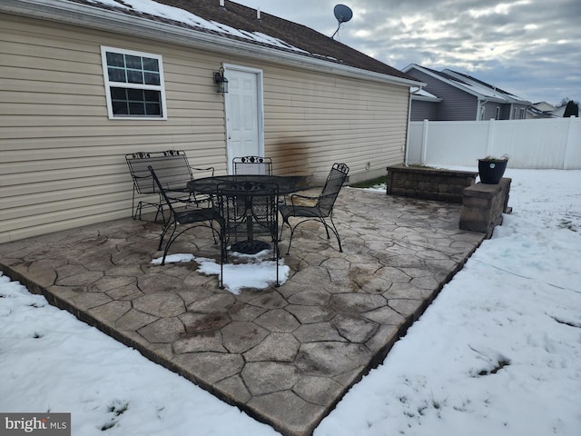 view of snow covered patio