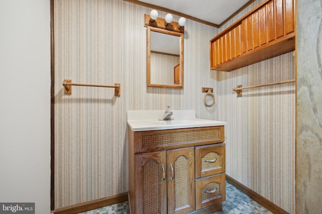 bathroom featuring vanity and crown molding