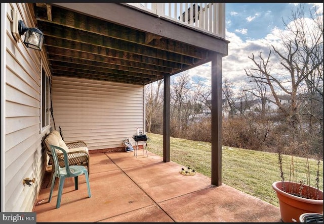 view of patio with a balcony