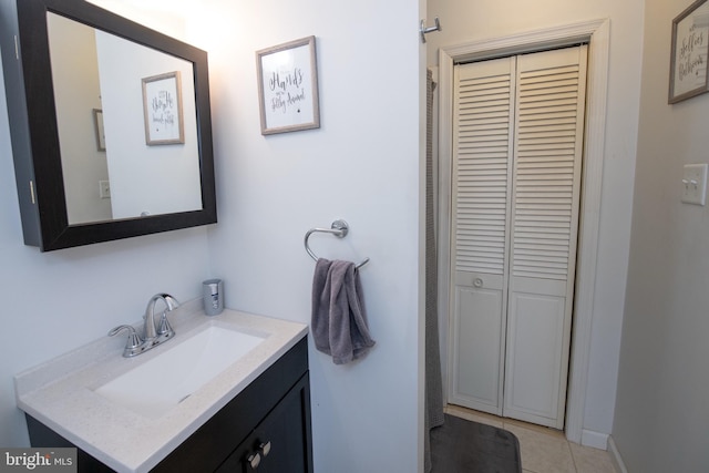 bathroom with vanity and tile patterned flooring