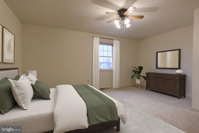 carpeted bedroom featuring ceiling fan