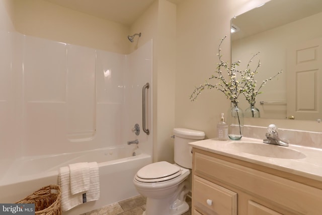 full bathroom with toilet, vanity, tile patterned flooring, and bathing tub / shower combination