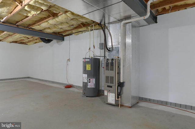 basement featuring heating unit and water heater