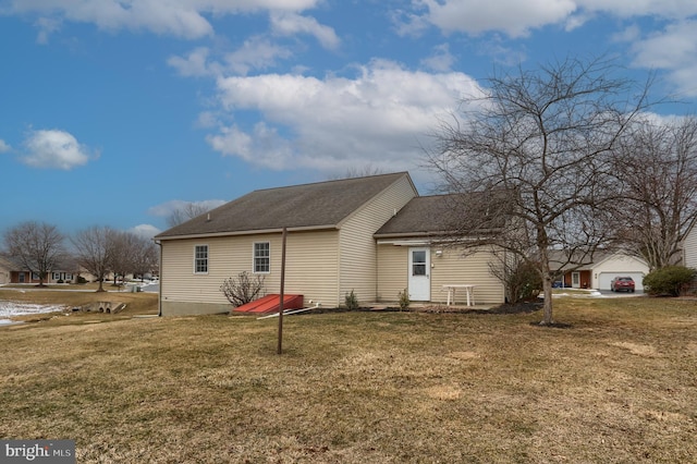 view of home's exterior featuring a yard