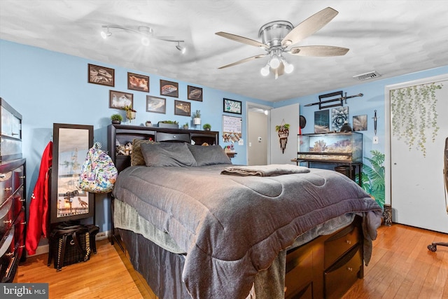 bedroom featuring ceiling fan and light wood-type flooring