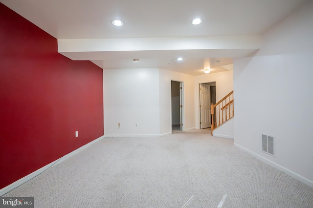 basement with light colored carpet