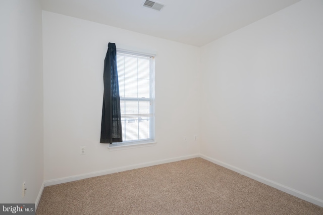 spare room with carpet flooring