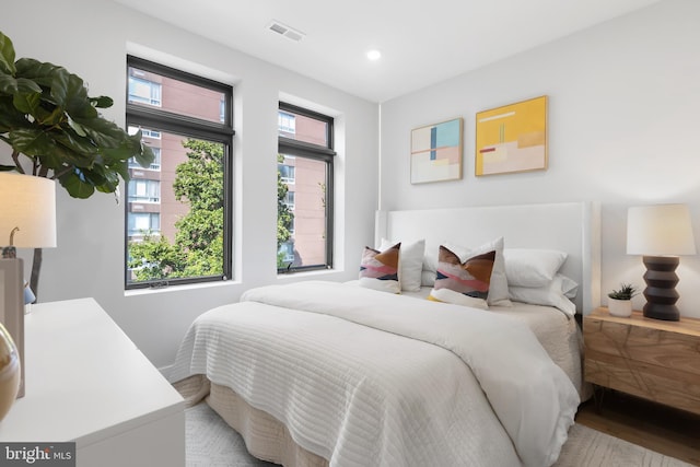 bedroom with light hardwood / wood-style floors