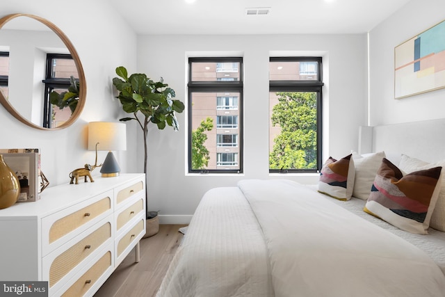 bedroom featuring light hardwood / wood-style floors