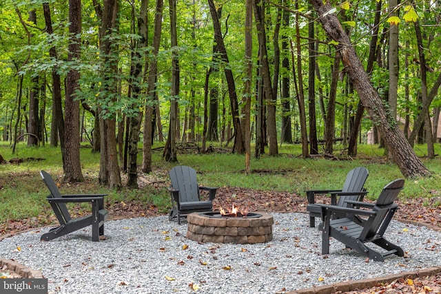 view of patio / terrace with an outdoor fire pit