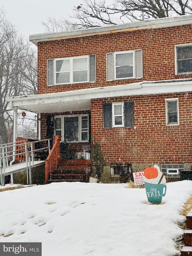 view of front of property featuring covered porch