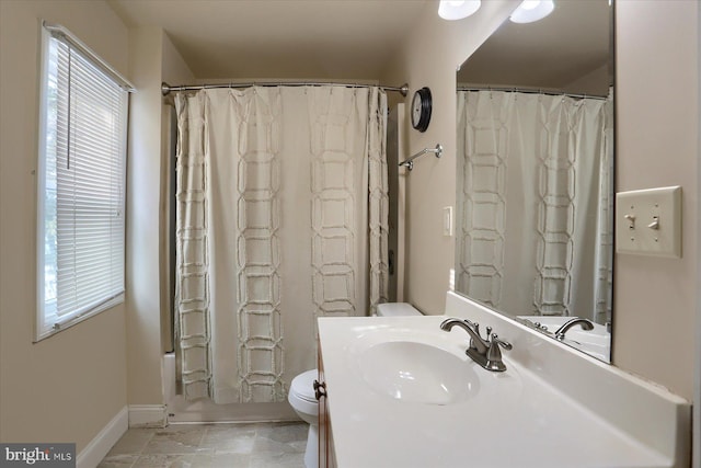 full bathroom with toilet, vanity, and shower / bathtub combination with curtain