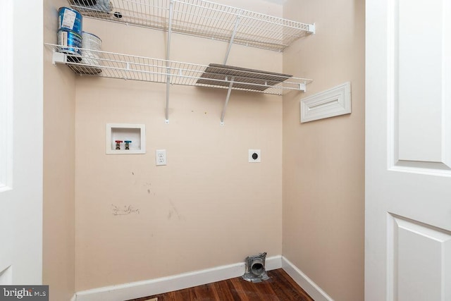 clothes washing area with electric dryer hookup, hookup for a washing machine, and dark wood-type flooring