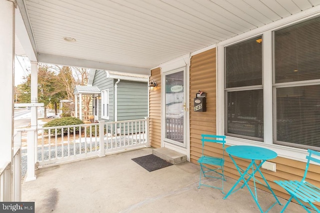 view of patio featuring a porch