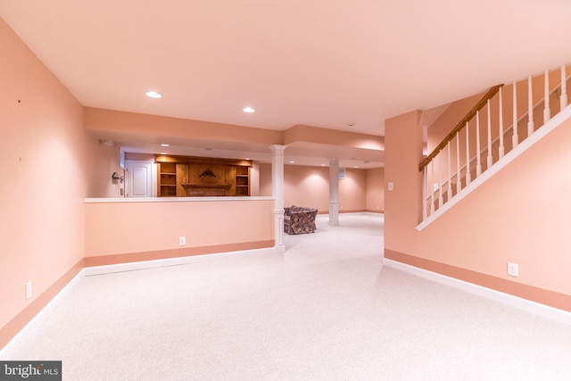 unfurnished living room featuring light carpet