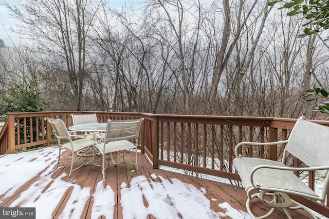 view of snow covered deck