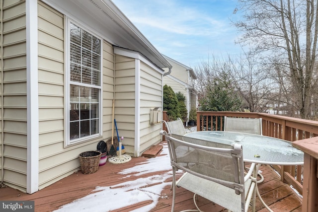 view of snow covered deck