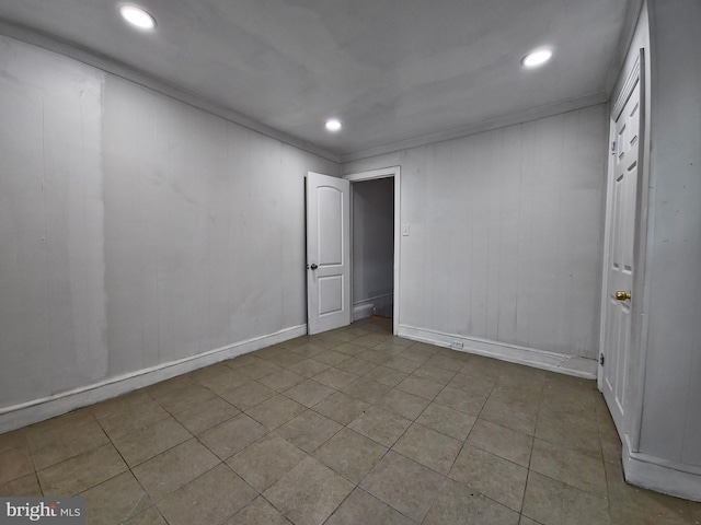 spare room featuring ornamental molding