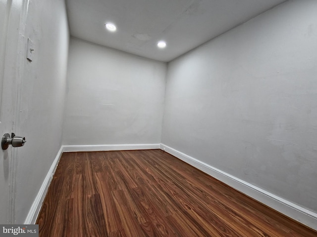 unfurnished room with hardwood / wood-style floors