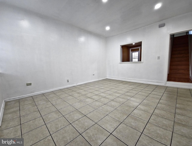 empty room featuring light tile patterned flooring