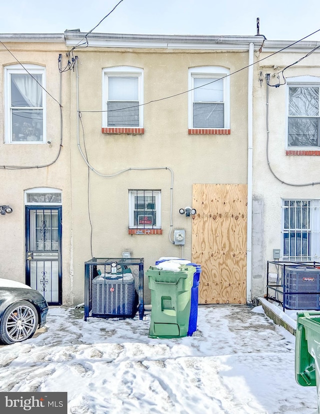 view of snow covered house